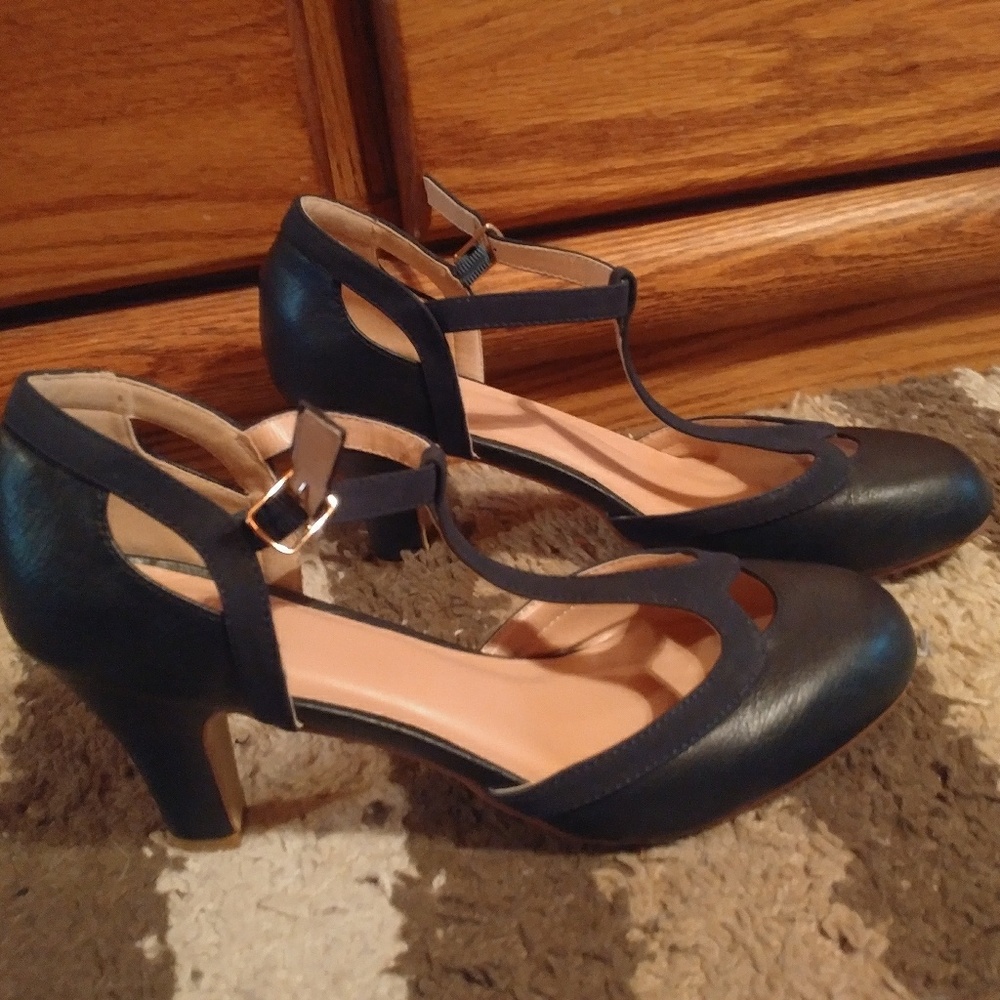 T-strap high heel shoes